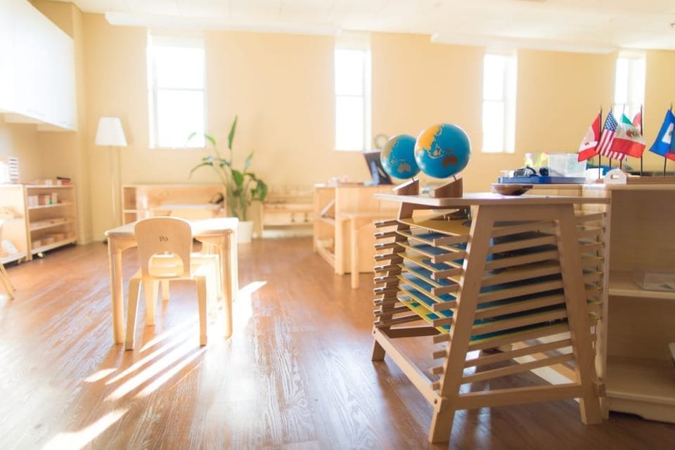Light-filled classroom with Montessori materials